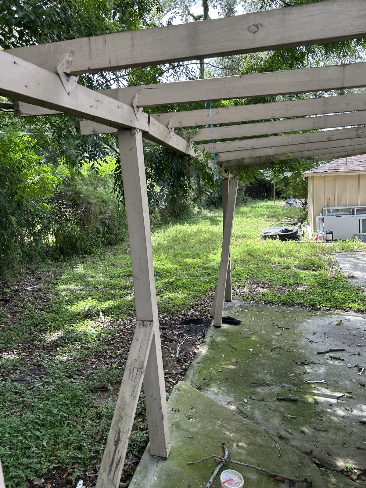 Carport frame, looking down the lot